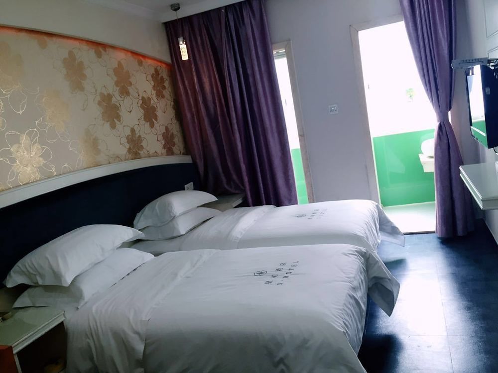 Xinghe Xinfeng Hotel Guangzhou Bagian luar foto