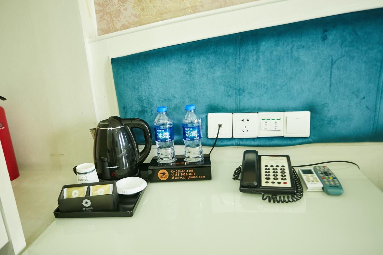 Xinghe Xinfeng Hotel Guangzhou Bagian luar foto
