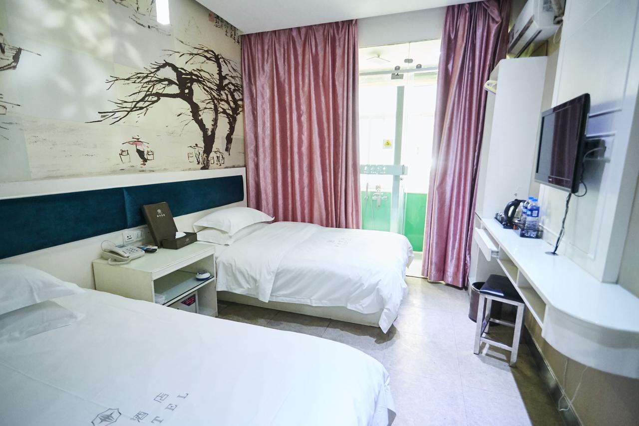 Xinghe Xinfeng Hotel Guangzhou Bagian luar foto